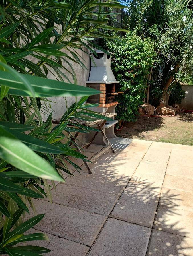 Location de vacances pour 8 personnes, avec piscine ainsi que jardin et vue à Cala Bona - 2