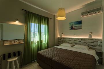 Cottage pour 2 personnes, avec vue et jardin dans Stoupa