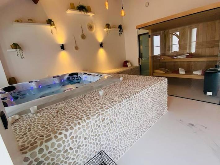 Maison de vacances pour 2 personnes, avec jardin ainsi que sauna et jacuzzi