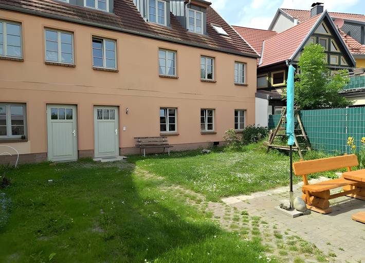 Appartement entier, Appartement « Fewo Backboard » avec terrasse partagée, jardin privé et Wi-Fi in Röbel, Lac Müritz