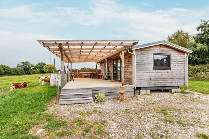 Ferienhaus für 4 Personen, mit Balkon und Garten
