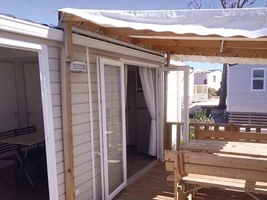 Camping Le Petit Mousse - Mobilhome 4 personnes - Mobil-home | Classic | 2 Ch. | 4 Pers. | Terrasse surélevée | Clim. in Vias Plage, Vias