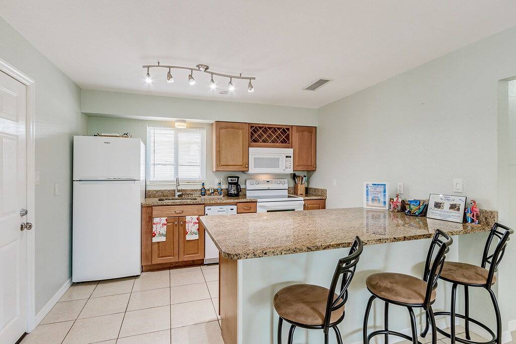 Fiesta Flamingo Cottage Blocks to Beach & River ~ Kayaks and Bikes Provided! in Cocoa Beach, Space Coast