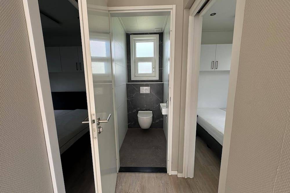 Elegantes Chalet für 4 Personen mit 2 Badezimmern, Terrasse, kostenlosem Wlan und luxuriöser Küche. in IJssel