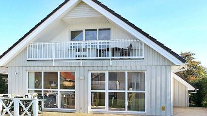 Ferienhaus mit Meerblick für 8 Personen, mit Whirlpool und Sauna sowie Garten in Gelting