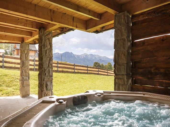 Chalet für 5 Personen, mit Terrasse und Whirlpool sowie Garten und Sauna