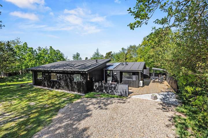 Bungalow für 6 Personen, mit Balkon/Terrasse und Whirlpool sowie Terrasse und Sauna in Dänemark an der Nordsee
