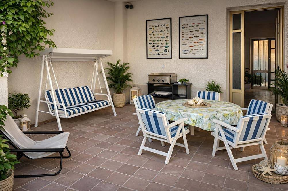 Sea Breeze Terrace Retreat on the Sicilian Coast in Mongiove, Patti