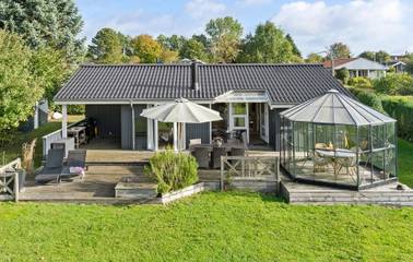 Ferienhaus für 6 Personen, mit Terrasse und Sauna sowie Garten und Whirlpool, mit Haustier in Pøt Strandby
