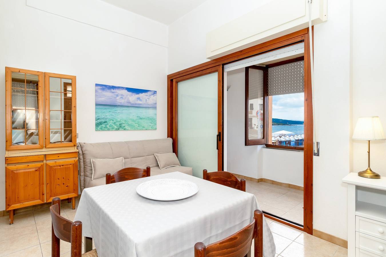 Apartamento entero, Apartamento "Casa Spiaggia Molo 1" en Isola Rossa con vista al mar y balcón in Trinità d'Agultu e Vignola, Olbia-Tempio