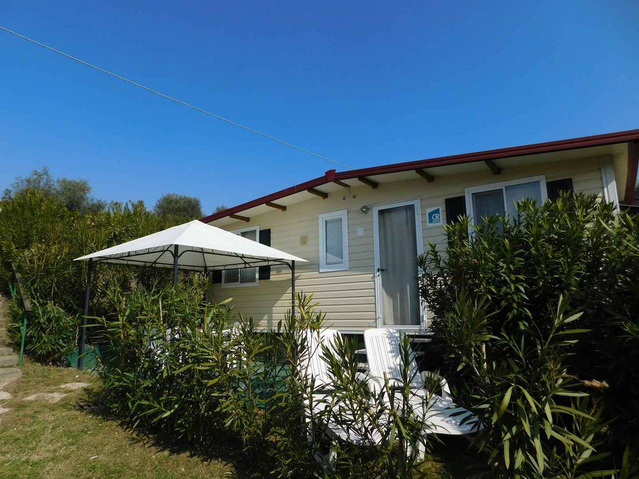 Casa mobile con aria condizionata, terrazza e piscina  in Spiaggia del Porto (Moniga del Garda), Moniga del Garda