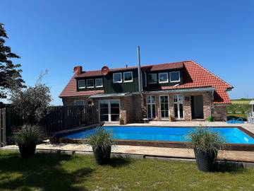 Ferienhaus für 4 Personen, mit Terrasse und Garten in Ostermarsch