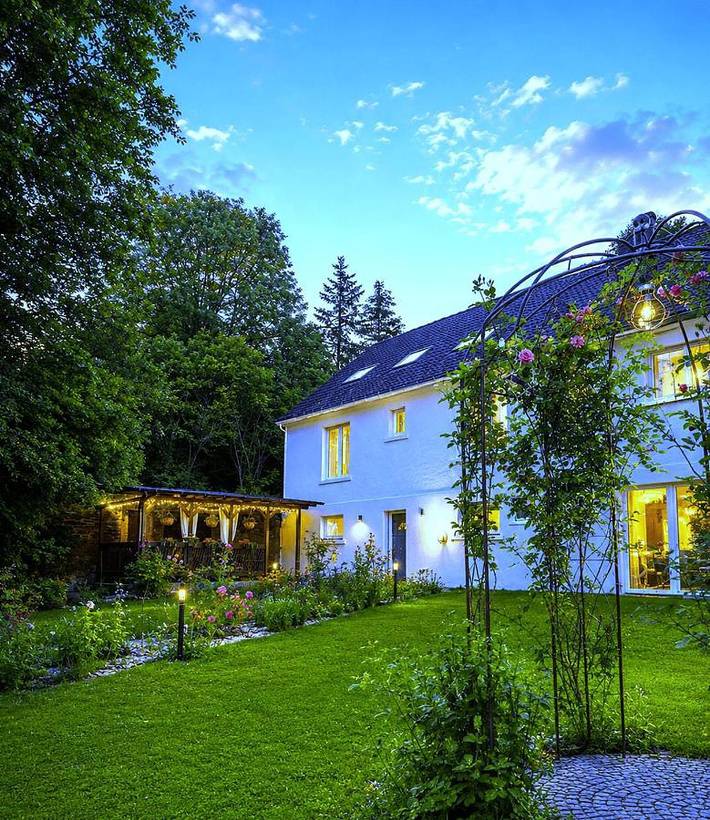 Ferienwohnung für 3 Personen, mit Terrasse und Garten sowie Ausblick