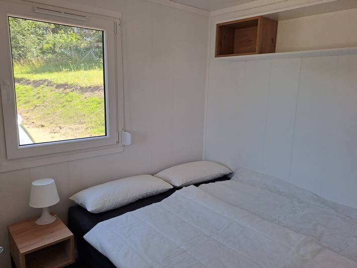 Hel semesterlägenhet, Tiny Home 'Haus Hecht' with Lake View, Wi-Fi, and Air Conditioning in Lohmen, Mecklenburgska sjöarna