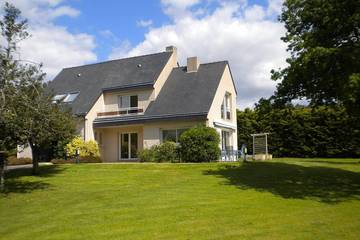Cottage pour 10 personnes, avec balcon et jardin dans Plage de la Mine d'Or