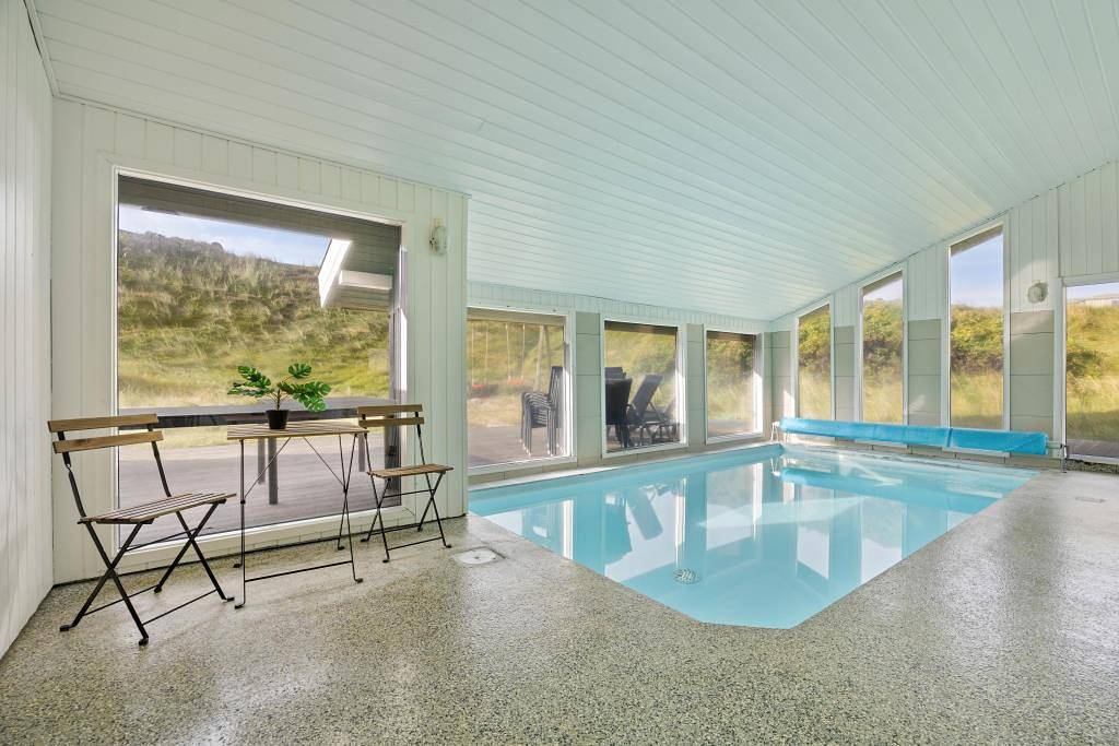 Strandnahes Ferienhaus mit Pool, Sauna, Spa und Fjordblick in Ringkøbing, Holmsland Klit