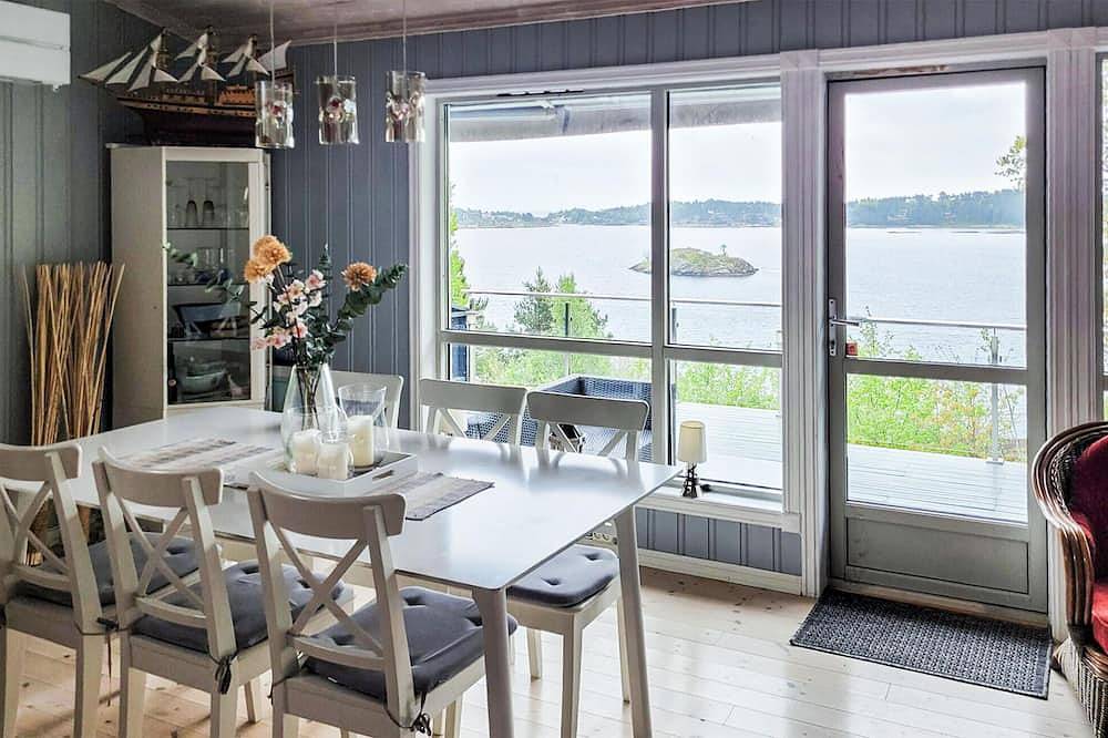 Beautiful home in Stathelle with house sea view in Bamble