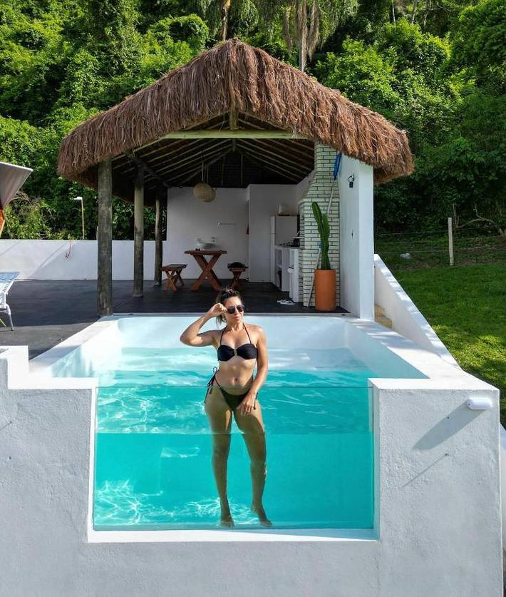 Casas e apartamentos de temporada para 4 pessoas, com jardim e balcão em Santa Isabel