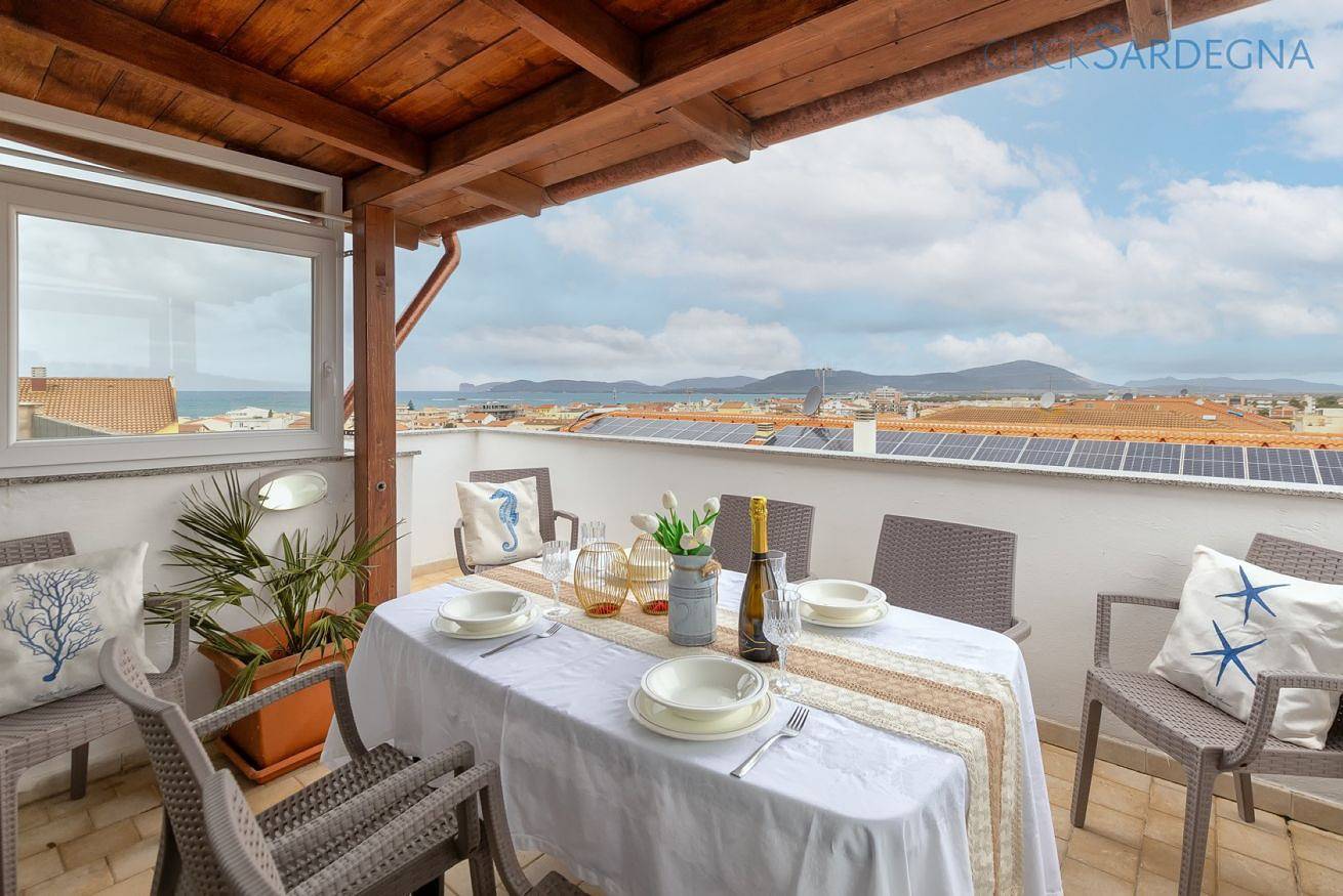 Apartamento entero, Apartamento de vacaciones para 4 personas con balcón/terraza in La Pietraia, Alguer