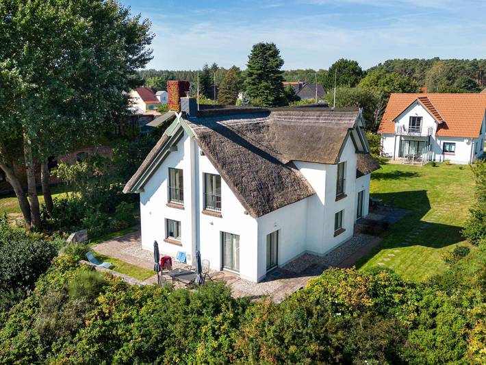 Ferienwohnung für 4 Personen, mit Terrasse und Garten sowie Seeblick und Ausblick in Freest