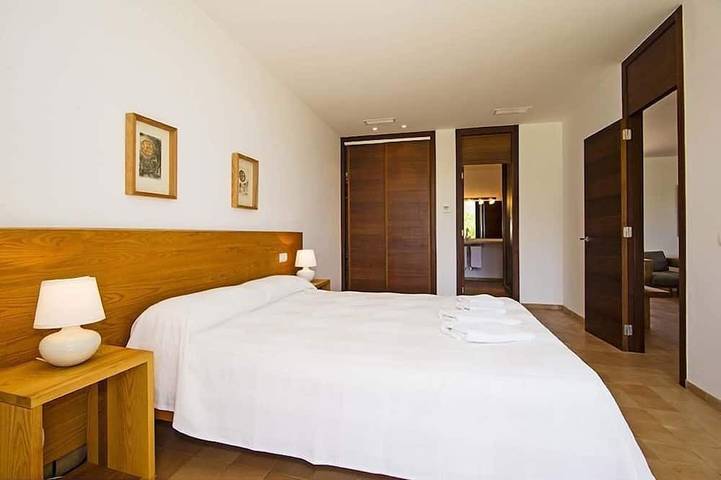 Luxury modern stone clad Villa with swimming pool and mountain views in Port de Pollença, Pollença
