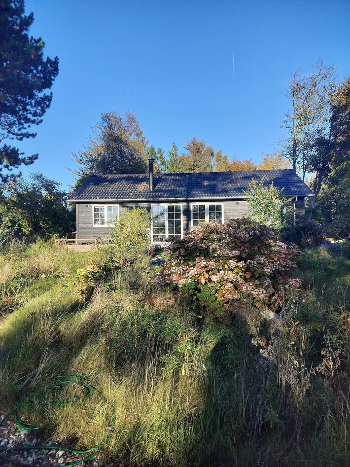 Ferienhaus für 6 Personen, mit Terrasse und Garten sowie Seeblick in Orø