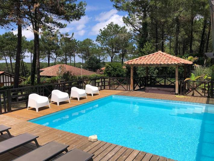 Location de vacances pour 12 personnes, avec jacuzzi ainsi que piscine et balcon dans Office De Tourisme De Moliets Et Maa - 4