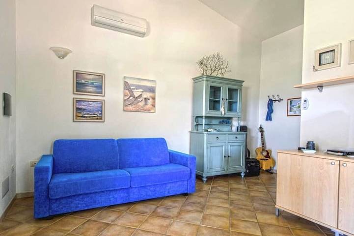 Villetta singola bifamiliare vicino a Budoni con giardino e veranda in Porto Ainu, Budoni