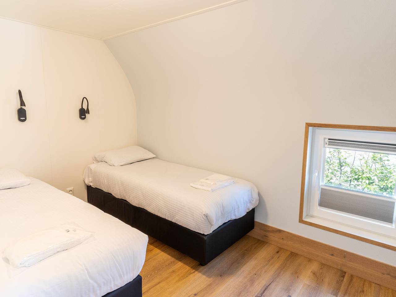 Vakantiehuis in bos bij vijver in Nationaal Park Weerribben-Wieden