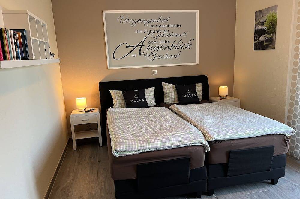 Ganze Wohnung, Familienfreundliche Ferienwohnung m. 2 Sz, Wintergarten, Wellness,Fahrrädern in Pewsum, Krummhörn