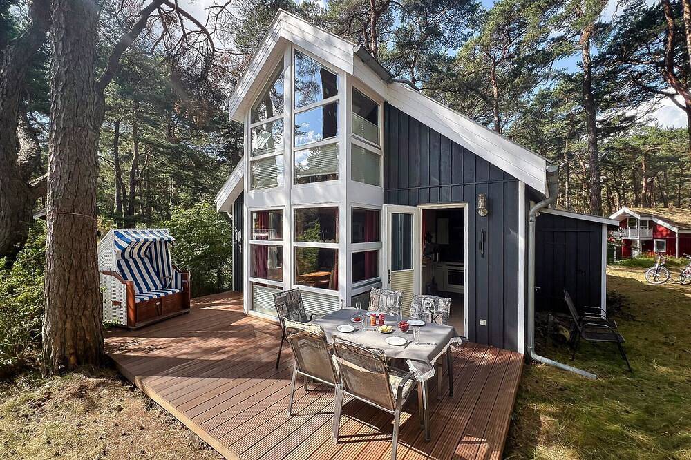 Ferienhaus Villa Hügel 222 in Baabe mit Meerblick. Kinderfreundliche Ausstattung. Stilvolles Wellnessbad mit Sauna & Whirlpool. Ladestation für Elektroautos – ideal für eine komfortable Anreise in Strand Baabe, Baabe