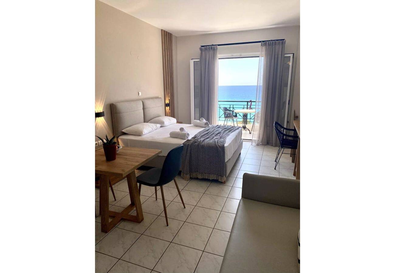 Entire studio, Apartment in a Hotel 'Sunset Premium Studio 9' with Sea View, Shared Pool, & Wi-Fi in Agios Nikitas, Greece