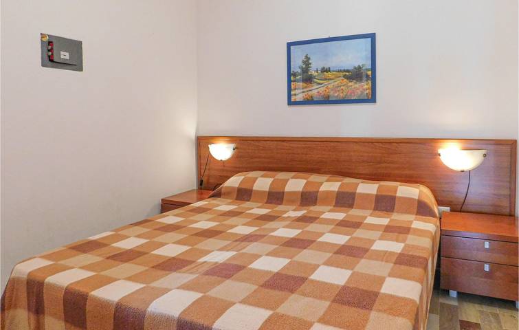 Ganze Ferienwohnung, Apartment am Meer mit AC, Küche, Terrasse | 400m zum Strand in Bibione, San Michele al Tagliamento