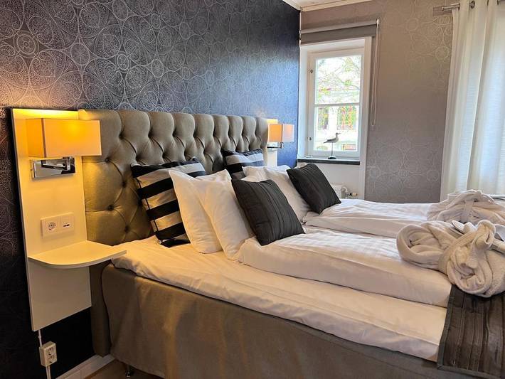 Hotel für 4 Personen, mit Terrasse und Garten sowie Sauna und Ausblick in Mariestad
