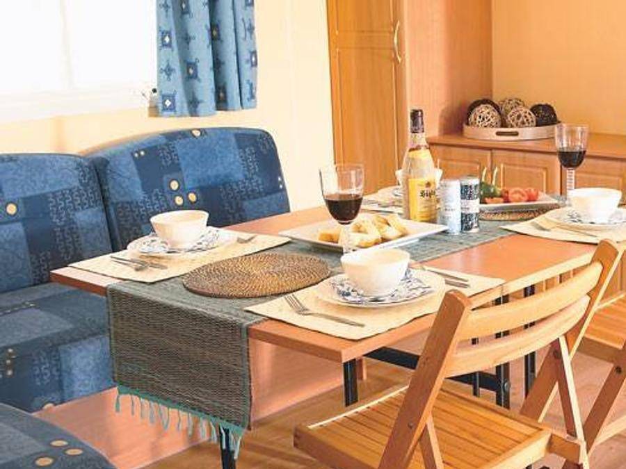 Camping Bella Austria - Mobilheim 6 personen - Classic | 2 Schlafz. | 4/6 Pers. | Erhöhte Terrasse in St. Peter am Kammersberg, Westliche Obersteiermark
