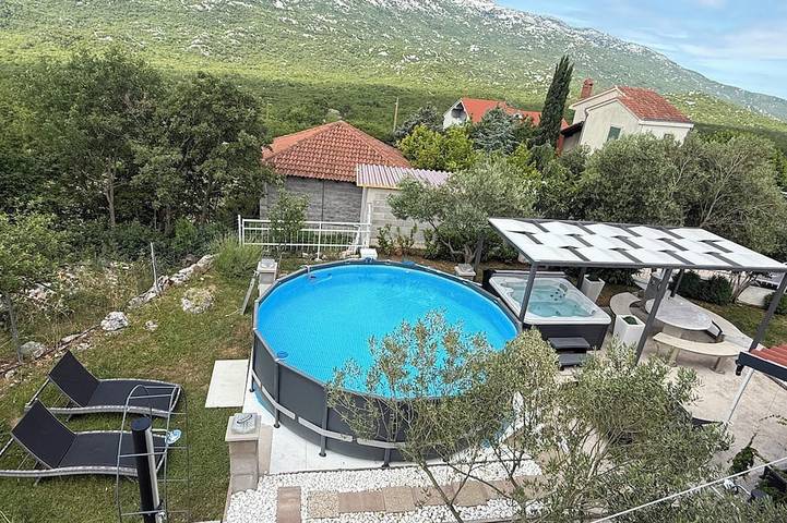 Ferienhaus für 4 Personen, mit Garten und Terrasse sowie Whirlpool, mit Haustier - 1