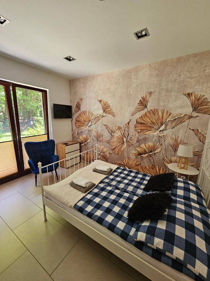 Ferienwohnung für 3 Personen, mit Terrasse und Garten sowie Kinderpool und Pool