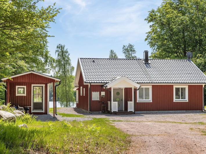 Ferienhaus für 8 Personen, mit Terrasse und Garten sowie Seeblick und Sauna - 1