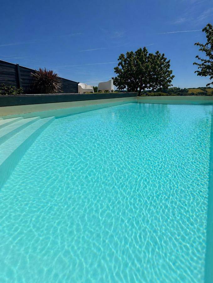 Appartement de vacances pour 4 personnes, avec Balcon et Terrasse ainsi que Jardin et Piscine