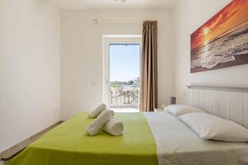Maison De Vacances pour 4 Personnes dans Spiaggia della Costa Merlata, Ostuni, Photo 1
