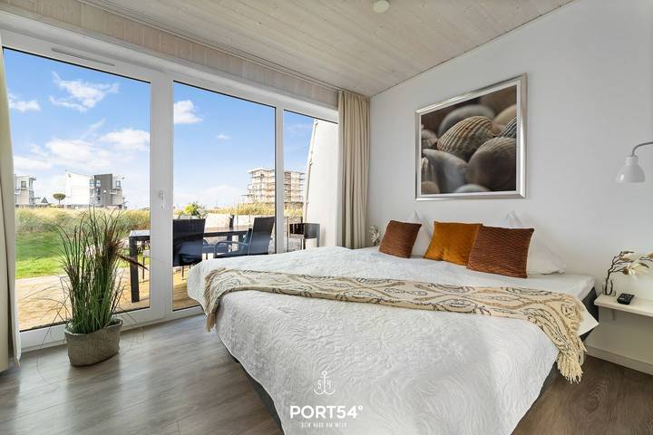 Ferienhaus für 4 Personen, mit Balkon und Whirlpool sowie Terrasse und Garten in Marina Wendtorf