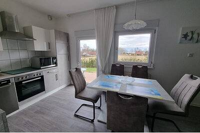 Ferienhaus für 5 Personen, mit Terrasse und Seeblick in Lütow - 4