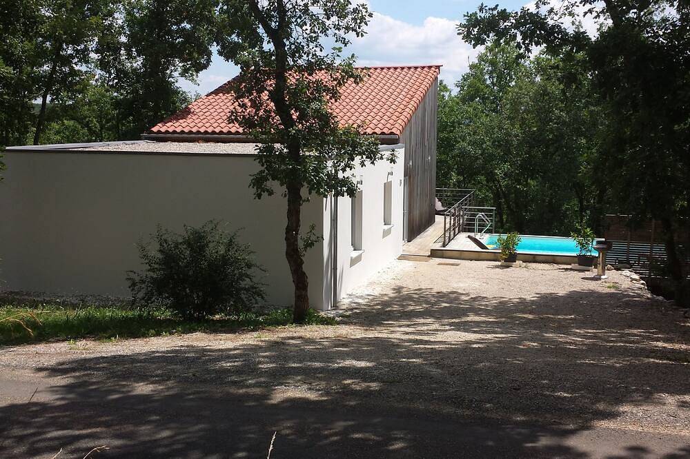 Maison bois moderne avec terrasse dans les arbres et piscine privée chauffée in Luzech, Quercy