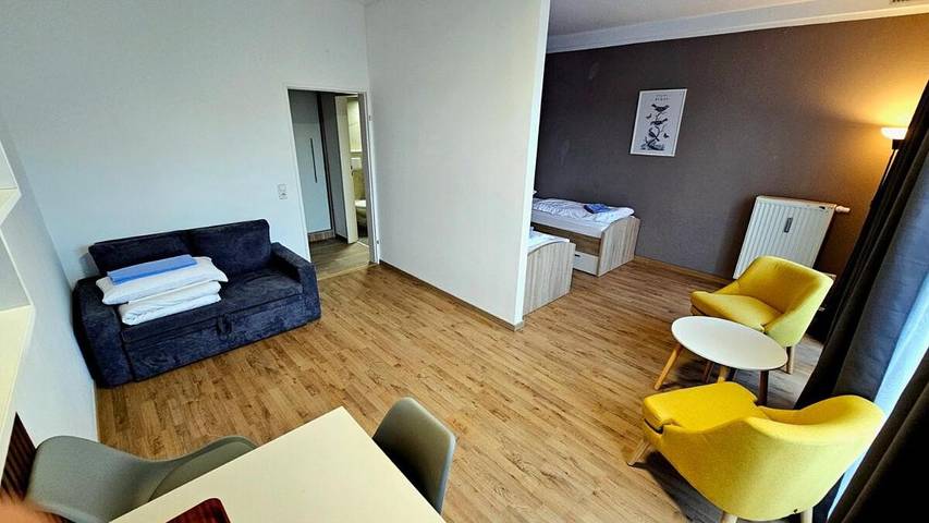 Ferienwohnung für 3 Personen, mit Balkon und Terrasse sowie Garten und Sauna in Oberschleißheim