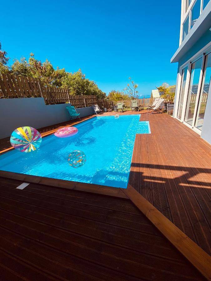 Location de vacances pour 10 personnes, avec piscine ainsi que vue et jardin, adapté aux familles à L'Étang-Salé - 4