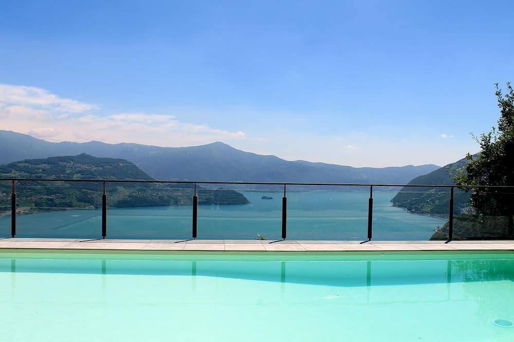 Apartamento entero, Apartamento en el lago Iseo 4/6 personas con piscina Vista al lago in Spiglia, Municipio de Parzanica