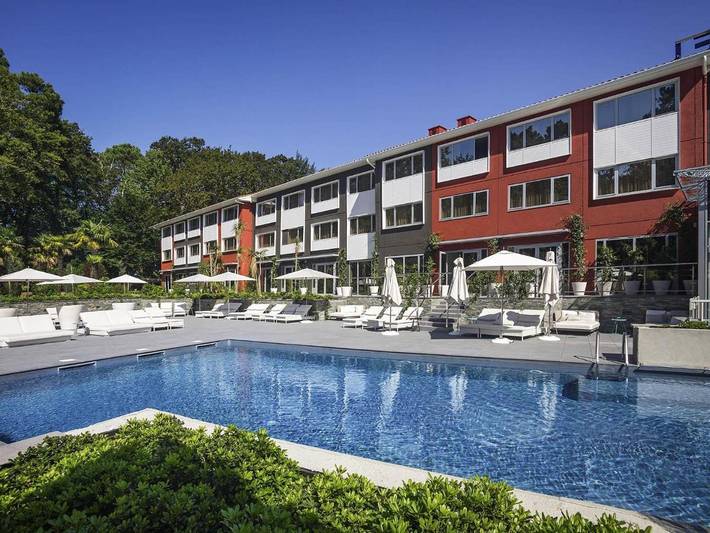Hôtel pour 4 personnes, avec Terrasse et Jardin ainsi que Piscine et Sauna
