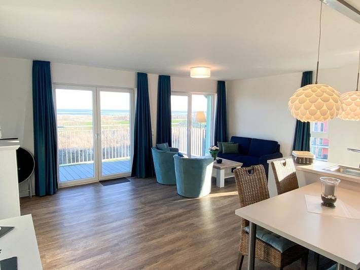 Ferienwohnung für 4 Personen, mit Balkon und Sauna sowie Ausblick in Schillig