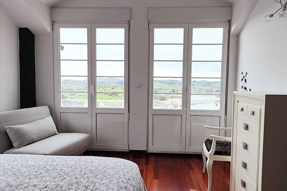 Cortiguera Villas Lighthouse in Suances, Cantabrian Coast