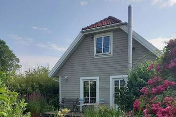 Ferienhaus für 2 Personen, mit Garten und Sauna sowie Terrasse, mit Haustier in Niesgrau